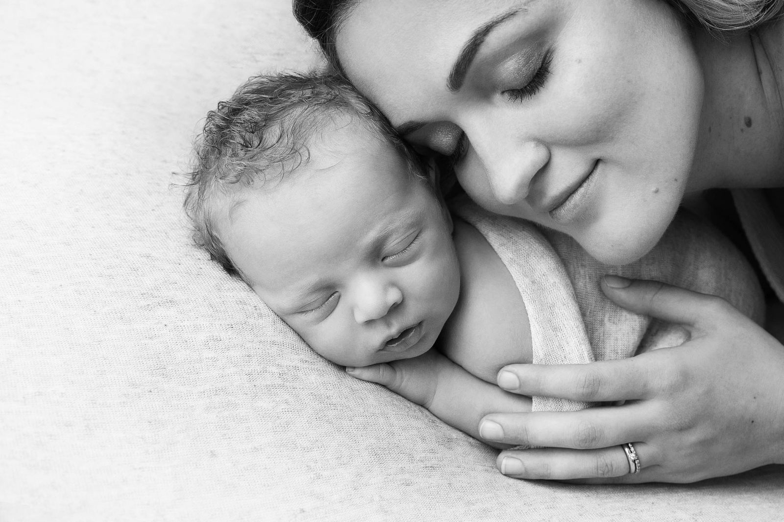 newborn baby with mother