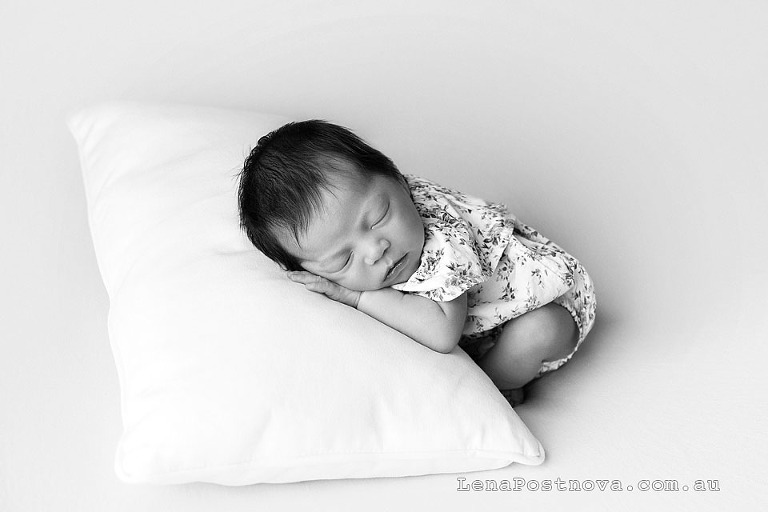 newborn baby girl on the pillow