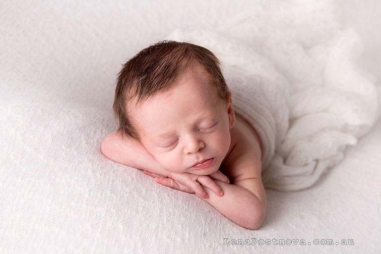 baby boy 2 weeks old sleeping posed portrait