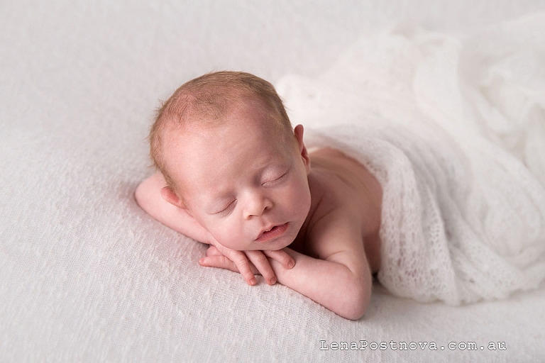 baby boy 2 weeks old sleeping posed portrait