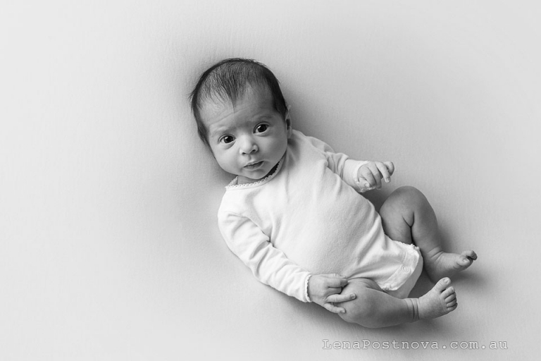 Newborn baby girl awake portrait