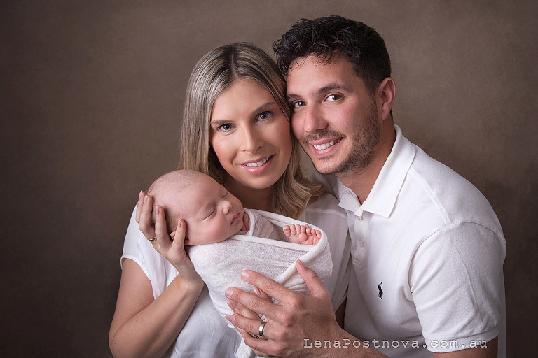 Newborn photography of older baby-  family photo with one months old baby