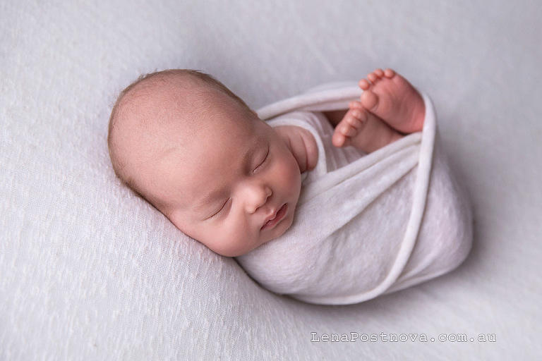 one months old newborn swaddled - Newborn photography of older baby