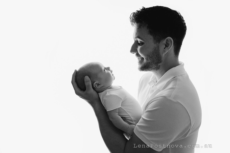 dad holding baby backlit - Newborn photography older baby 