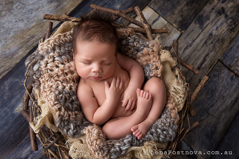 Newborn Baby Photography Sydney - cute baby boy 5 weeks old in the prop