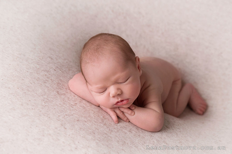 Newborn baby sleeping on the tummy