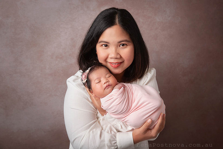 studio style mother and newborn portrait captured at home newborn photo shoot 