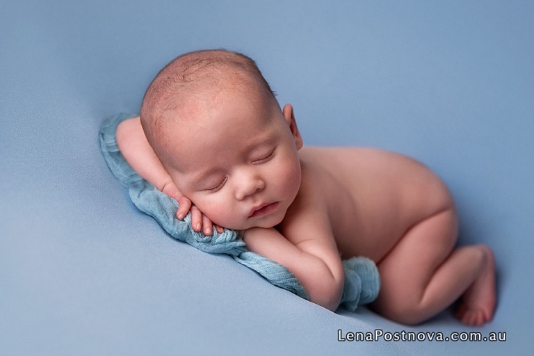 7 weeks old newborn posed on the bean bag