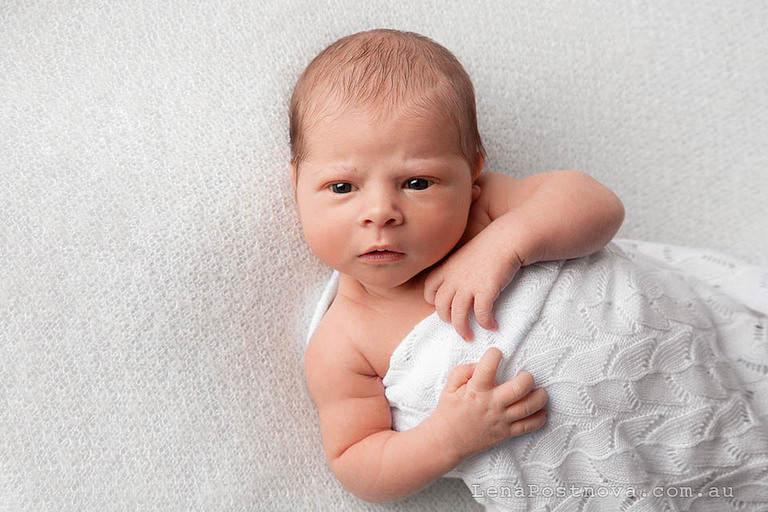 awake newborn baby girl 