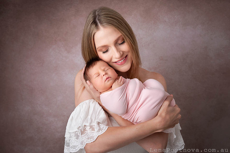 Newborn photography in your home of Mother and Baby