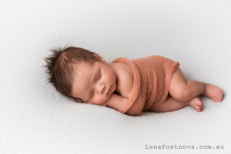 Newborn Photography Poses - baby on the side 