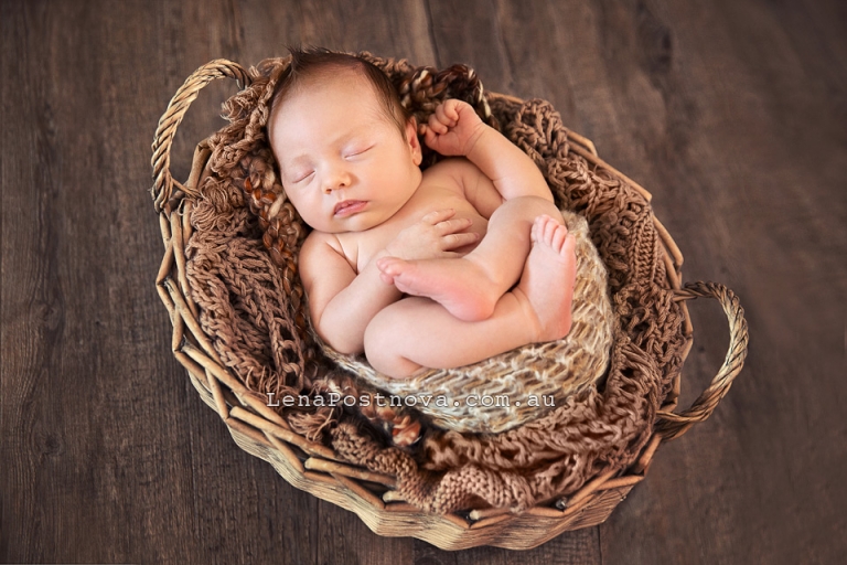 Newborn baby in the backet