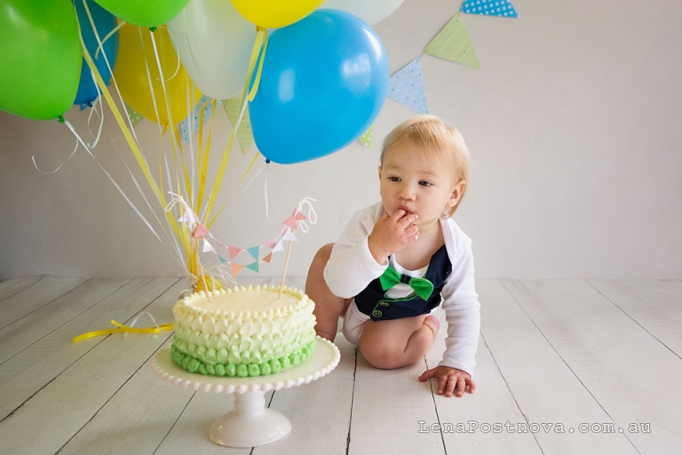 sydney smash cakes - baby boy's tasting the cake