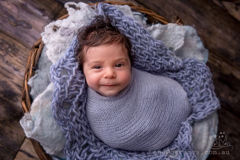 cute 5 weeks old baby boy in the basket