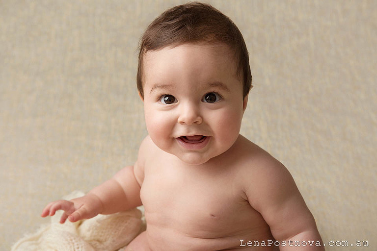 cute 6 months old little boy close up portrait 
