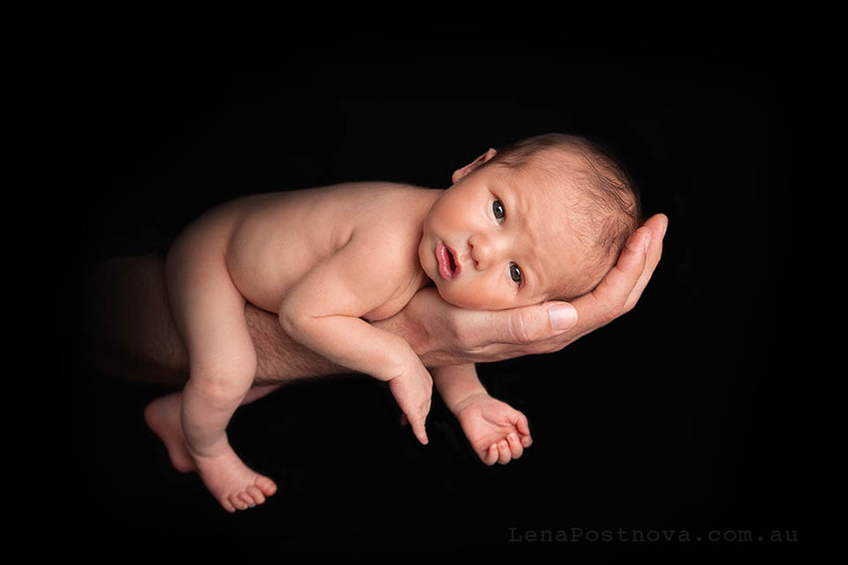 adorable baby in his father hands 