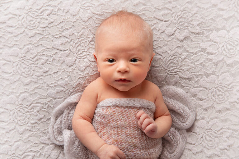 awake newborn at her newborn photo shoot Sydney