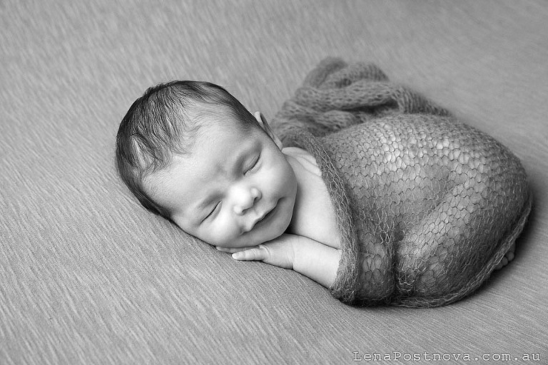 newborn smiling 