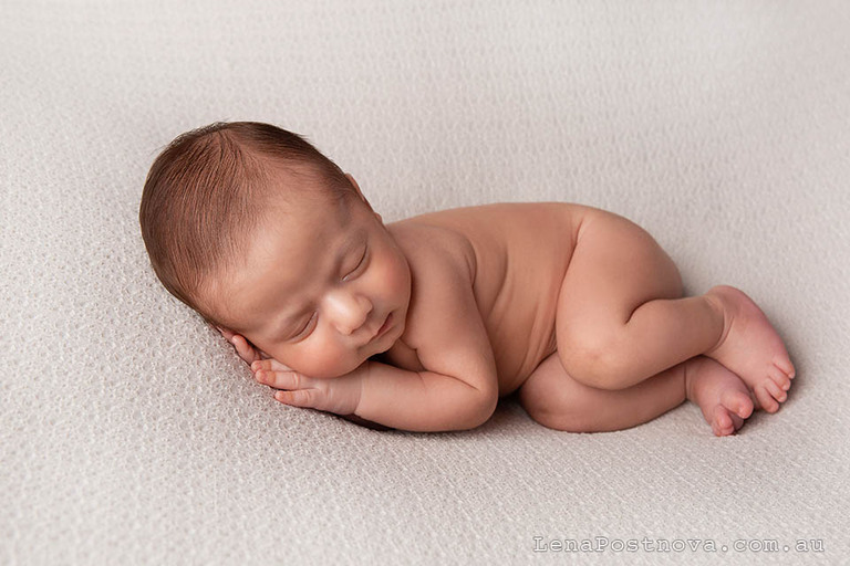 Capturing the perfect nap time during At-Home Newborn Photography session
