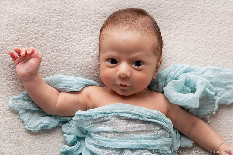 Newborn baby awake during At-Home Newborn Photography session